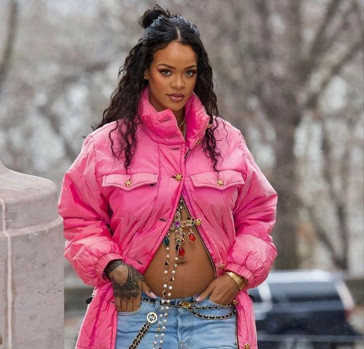Rihanna reveals baby bump