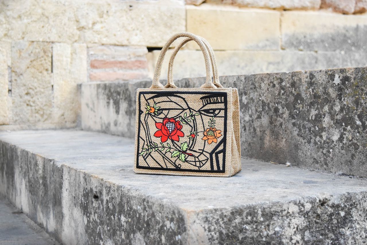 Emily (In Paris) Adds Handbag By Moroccan Artist Nadia Chellaoui